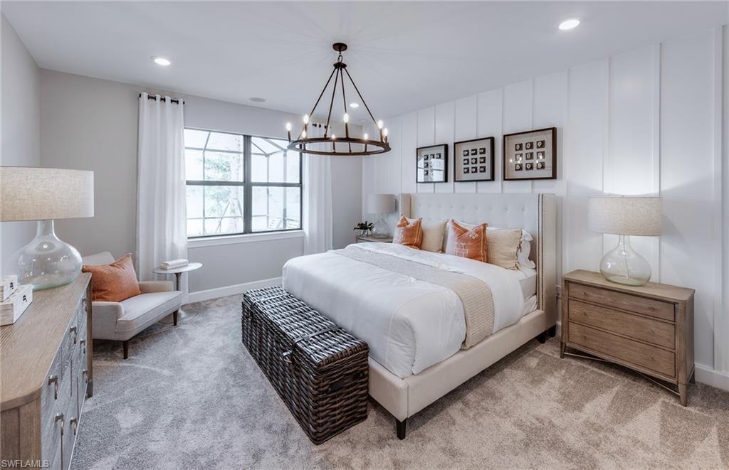 15665 Northridge Road Punta Gorda, FL 33982 - Photo 10 of 49 a spacious bedroom with a bed and a window
