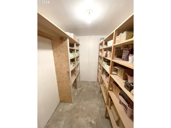 a kitchen with sink cabinets and refrigerator