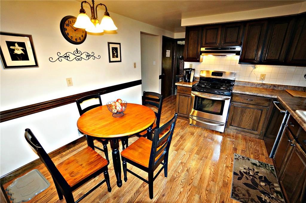 131 Valley View Road Eighty Four, PA 15330 - Photo 11 of 25 Plenty of room for everyone to grab a seat...gas stove, dishwasher, refrigerator all stay