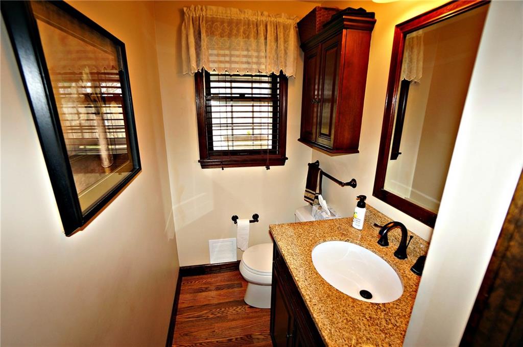 131 Valley View Road Eighty Four, PA 15330 - Photo 14 of 25 The warmth and beauty of natural wood in this main level powder room
