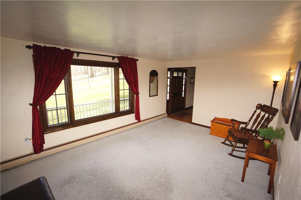 131 Valley View Road Eighty Four, PA 15330 - Photo 4 of 25 the inviting front porch leadsto a practical foyer, and then into the spacious living room with the oversized window