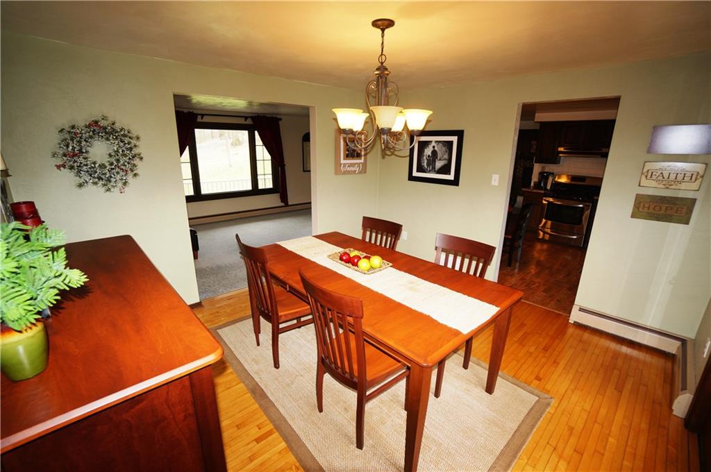 131 Valley View Road Eighty Four, PA 15330 - Photo 6 of 25 Enter the dining room with real hardwood flooring...