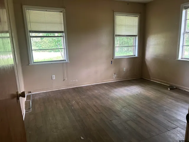 an empty room with windows