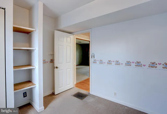 a sink sitting next to a bathroom sink