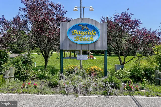 a view of a golf course with a road