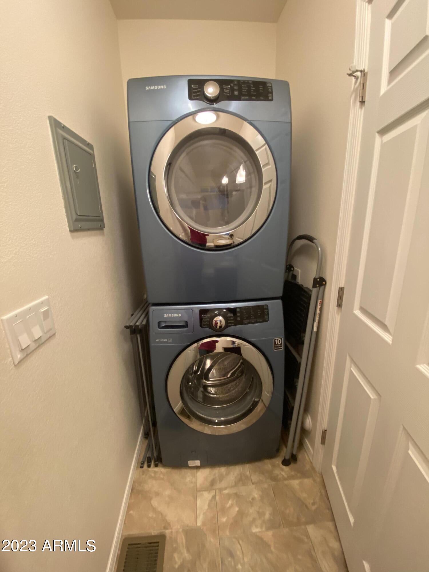 1358 Kiowa Circle, Unit 358 Apache Junction, AZ 85119 - Photo 24 of 37 a utility room with dryer and washer