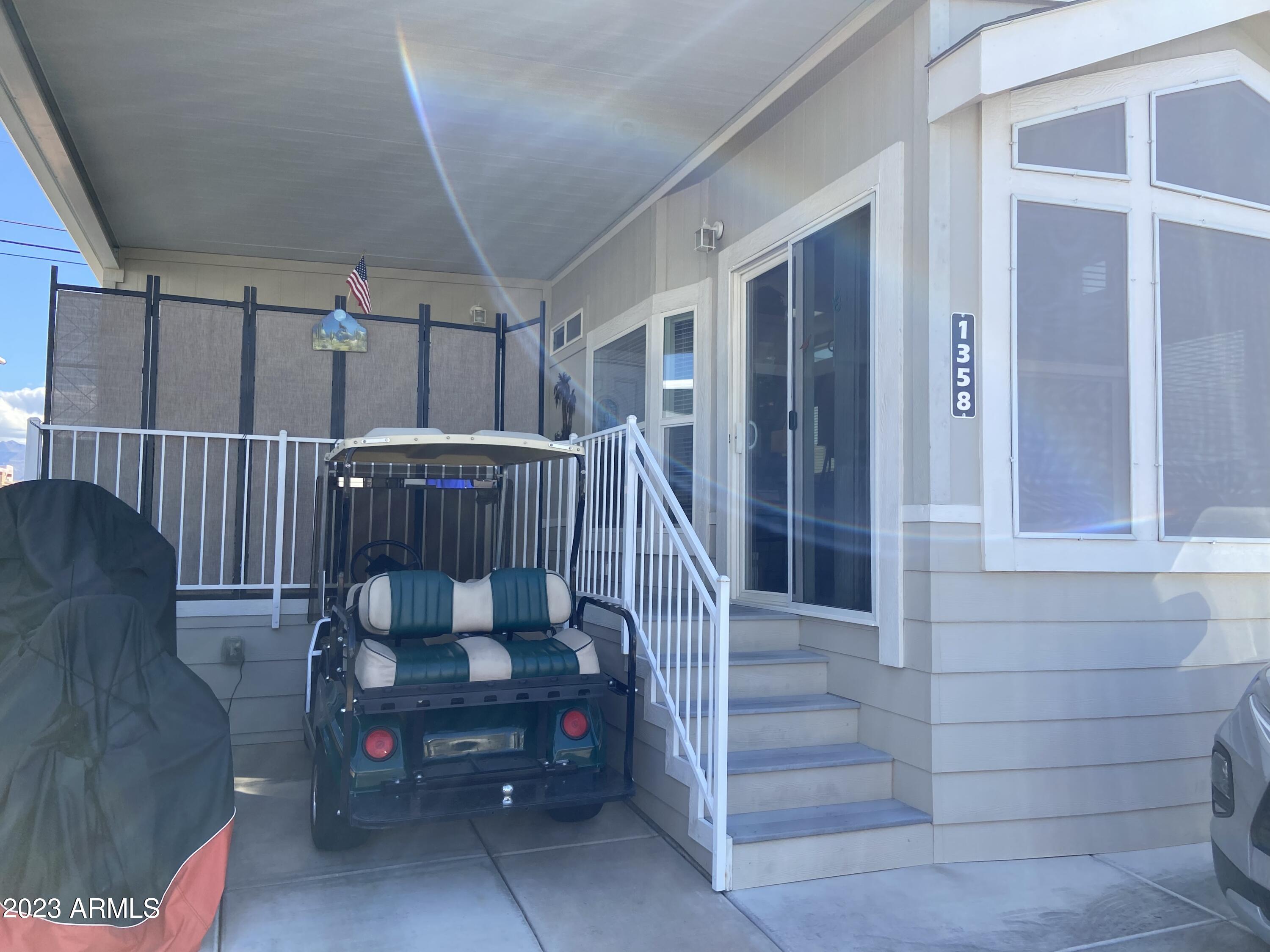 1358 Kiowa Circle, Unit 358 Apache Junction, AZ 85119 - Photo 35 of 37 a view of entryway with wooden floor