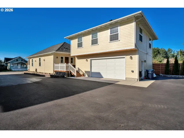 a view of a house with a street