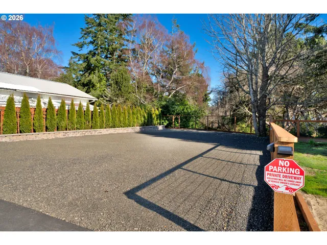 a view of a street with flower on the side of the road
