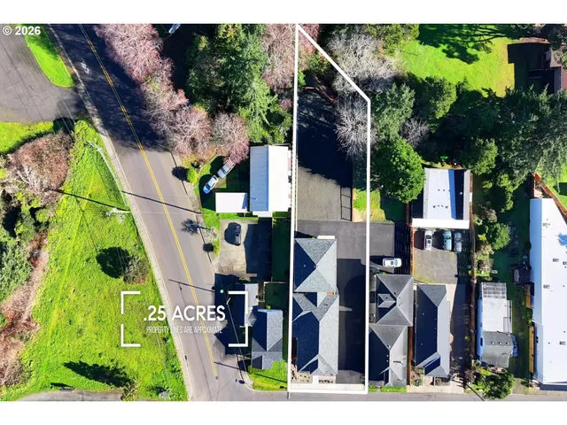an aerial view of houses with outdoor space