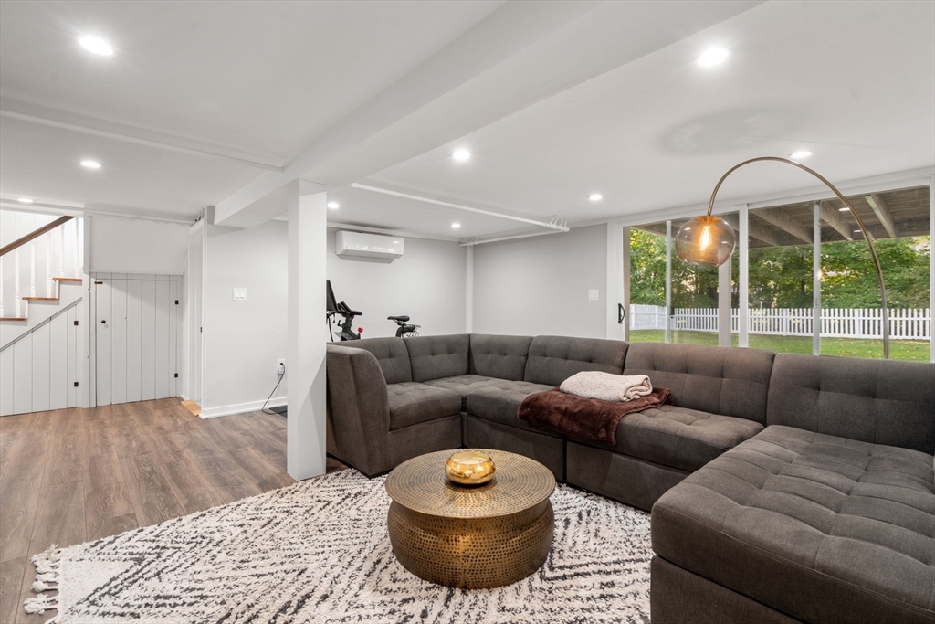317 Dedham Avenue Needham, MA 02492 - Photo 18 of 29 a living room with furniture and a large window