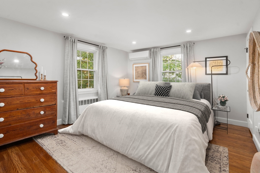 317 Dedham Avenue Needham, MA 02492 - Photo 20 of 29 a bedroom with a bed and a dresser