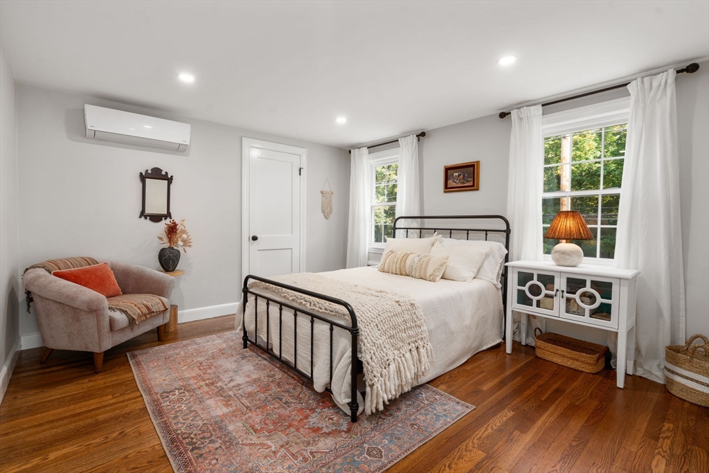 317 Dedham Avenue Needham, MA 02492 - Photo 21 of 29 a bedroom with a bed and a couch