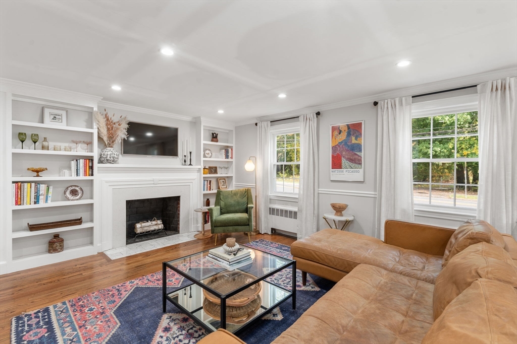 317 Dedham Avenue Needham, MA 02492 - Photo 5 of 29 a living room with furniture fireplace and flat screen tv