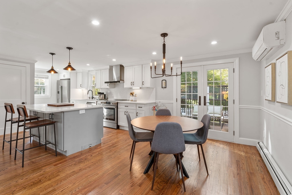 317 Dedham Avenue Needham, MA 02492 - Photo 8 of 29 a view of a dining room with furniture and wooden floor