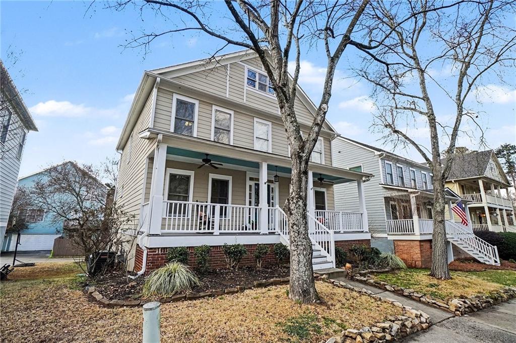 2113 Adams Overlook Northwest Atlanta, GA 30318 - Photo 1 of 1 a front view of a house with a yard
