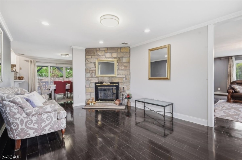 112 Knob Hill Road Hackettstown, NJ 07840 - Photo 14 of 32 a living room with furniture and a fireplace