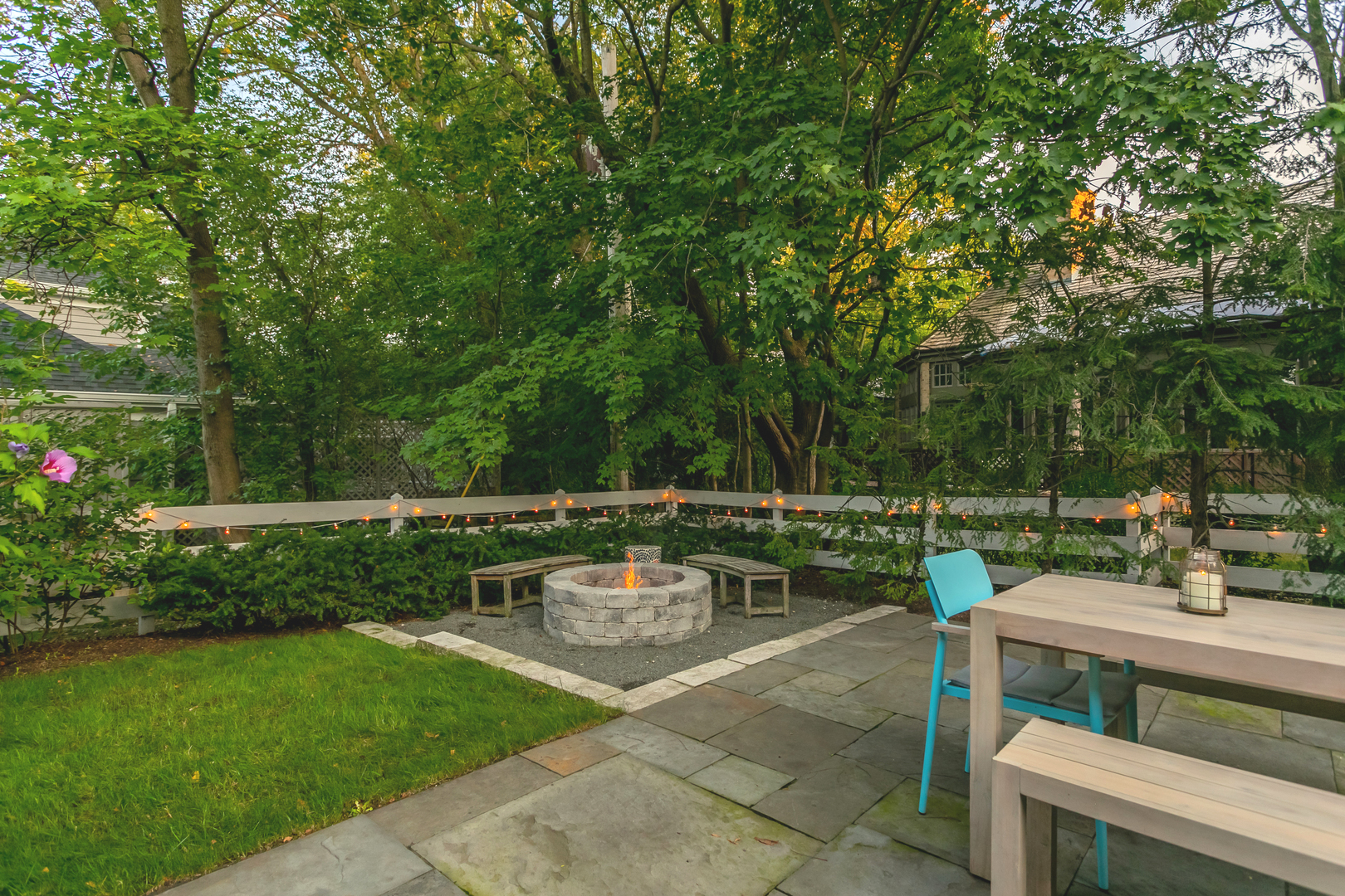 1309 Ridgewood Drive Northbrook, IL 60062 - Photo 16 of 18 a view of a patio with couches chairs and a fire pit