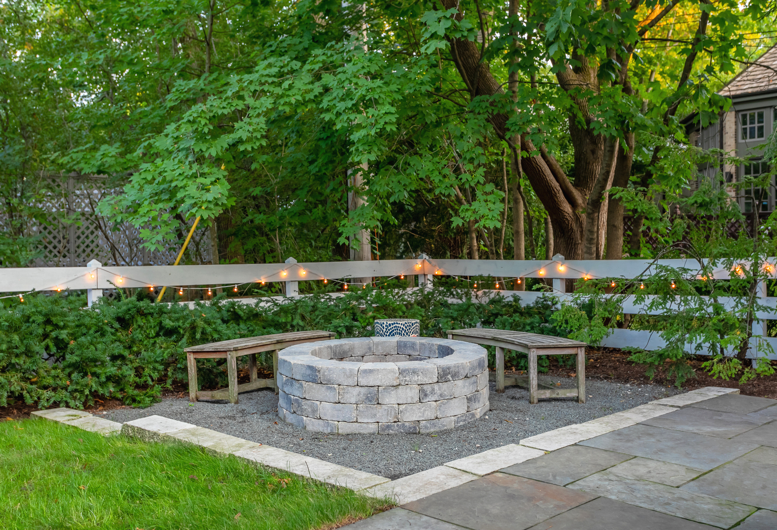 1309 Ridgewood Drive Northbrook, IL 60062 - Photo 17 of 18 a view of a chairs and table in backyard of the house