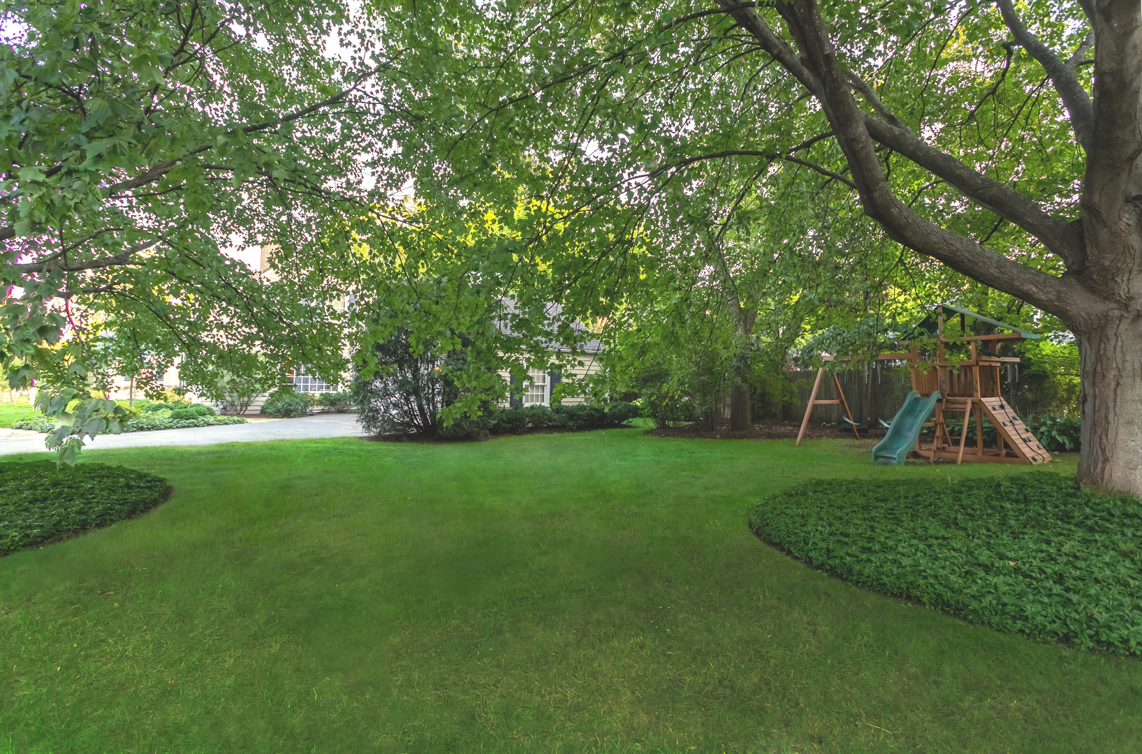 1309 Ridgewood Drive Northbrook, IL 60062 - Photo 18 of 18 a view of a field with large trees