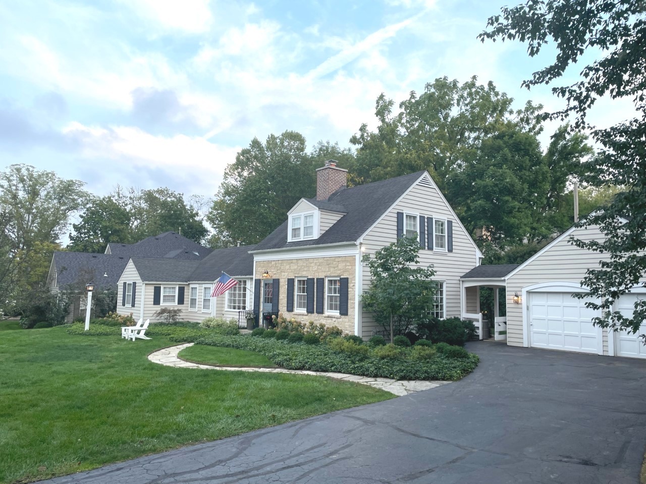 1309 Ridgewood Drive Northbrook, IL 60062 - Photo 2 of 18 a front view of a house with garden