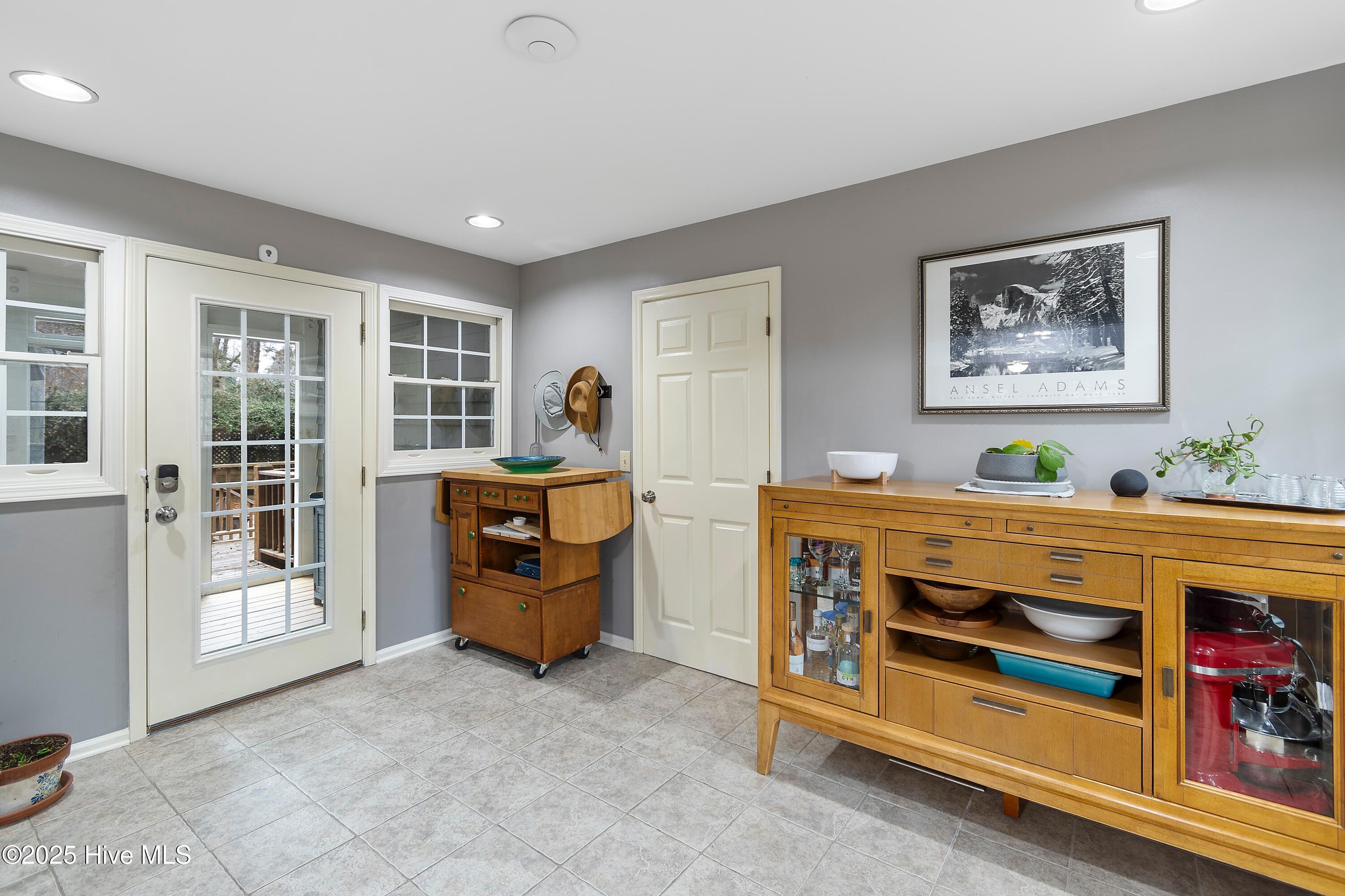 103 Ridge Road Hampstead, NC 28443 - Photo 28 of 60 Flex Space - Access Screened in Porch, Garage, Laundry, Bonus Room, Deck to Fountain!