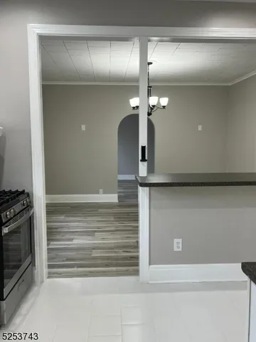 a bathroom with a light fixture and a sink