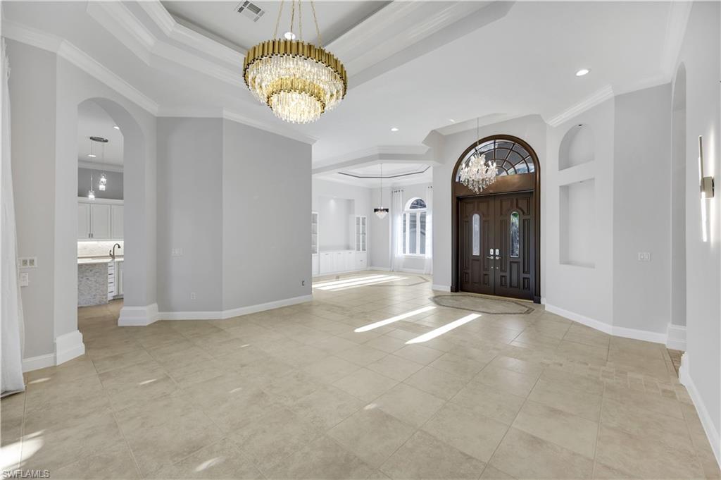10072 Orchid Ridge Lane Estero, FL 34135 - Photo 12 of 48 a view of an empty room and a windows