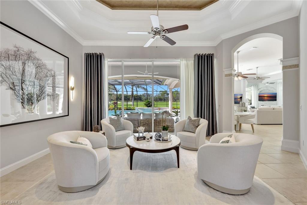 10072 Orchid Ridge Lane Estero, FL 34135 - Photo 20 of 48 a living room with furniture and a large window