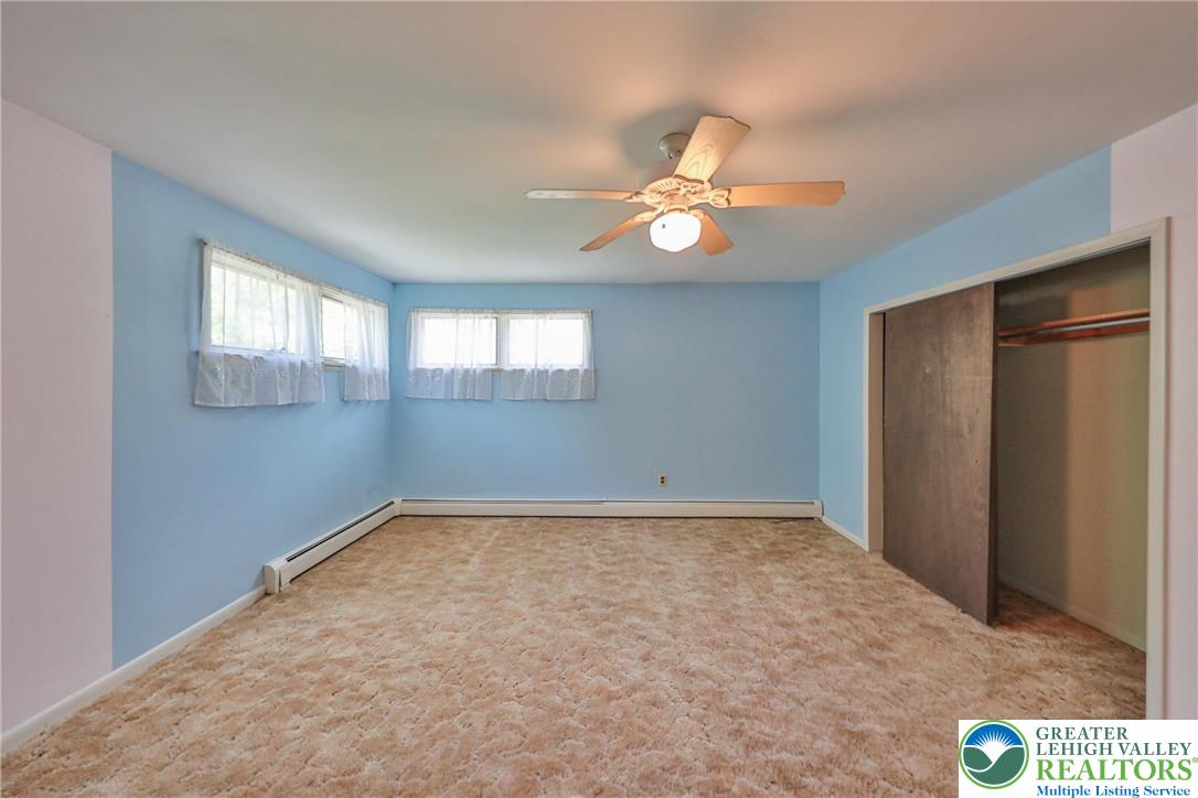 331 Cranberry Creek Road Cresco, PA 18326 - Photo 49 of 95 Well-lit room with ample natural light and a practical closet with sliding doors.