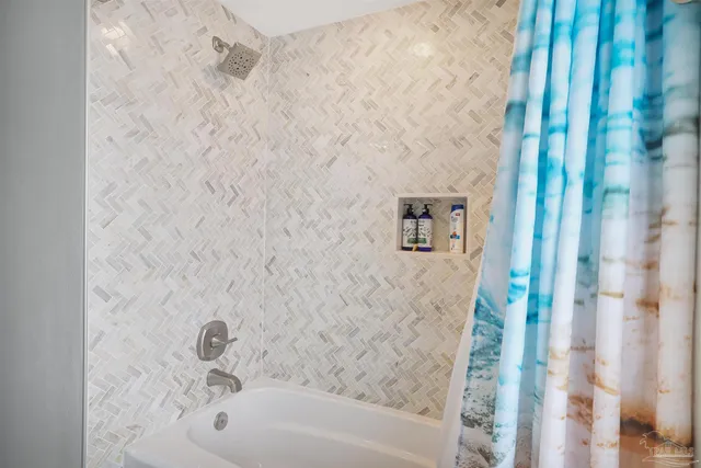 a bathroom with a bathtub