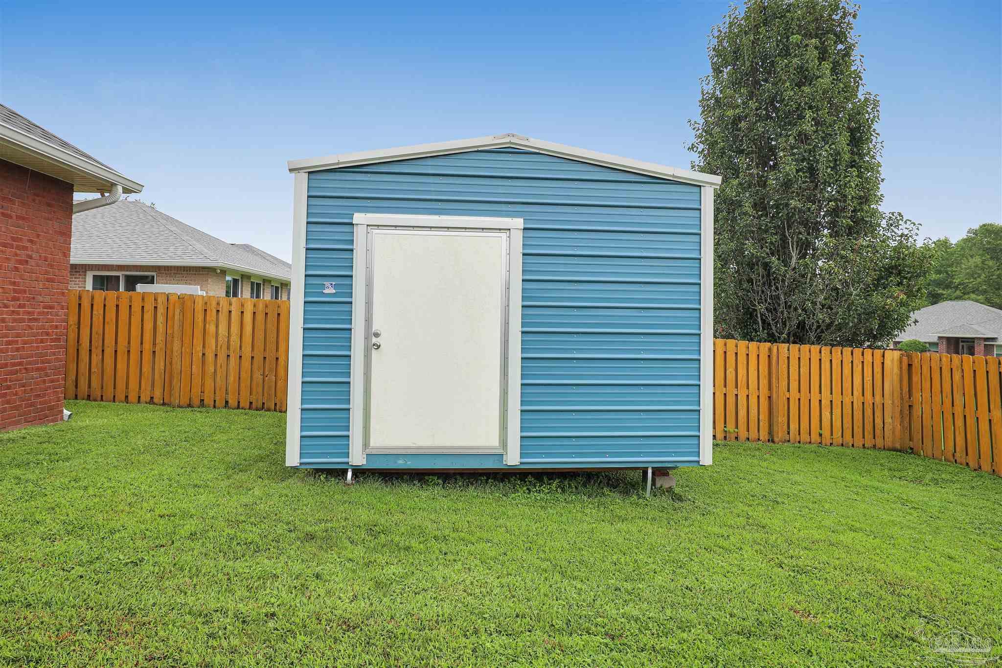 2822 Frederick Street Cantonment, FL 32533 - Photo 33 of 42 a front view of a house having yard