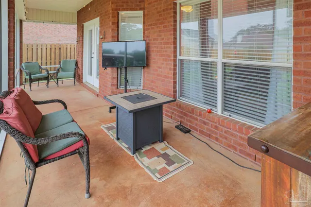 a backyard of a house with seating space