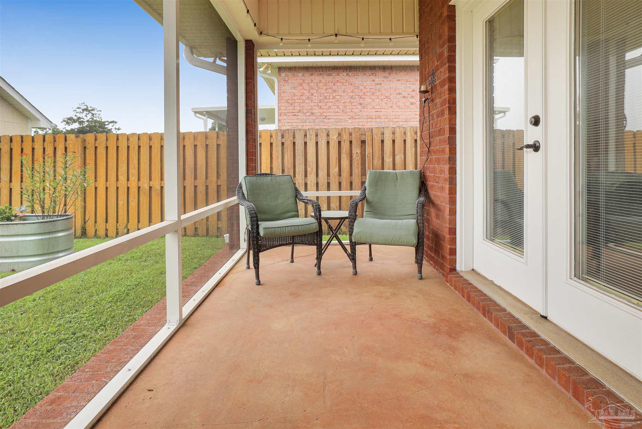2822 Frederick Street Cantonment, FL 32533 - Photo 37 of 42 a view of a two chairs in the balcony