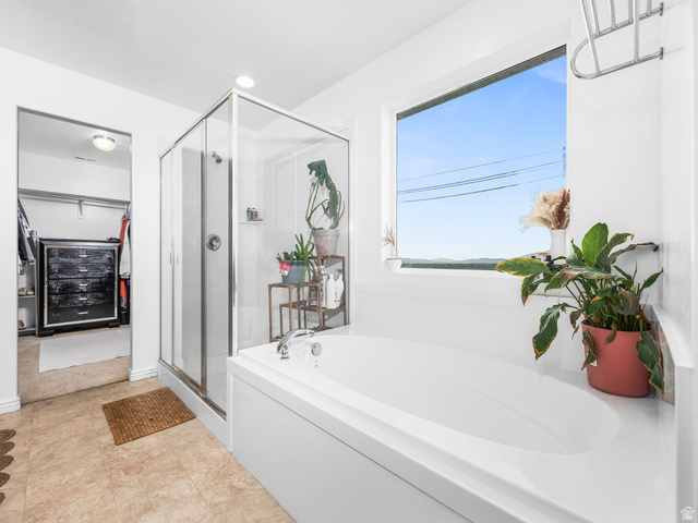 256 West Horizon Loop Payson, UT 84651 - Photo 20 of 33 Full bathroom with a bath, a stall shower, a spacious closet, and recessed lighting