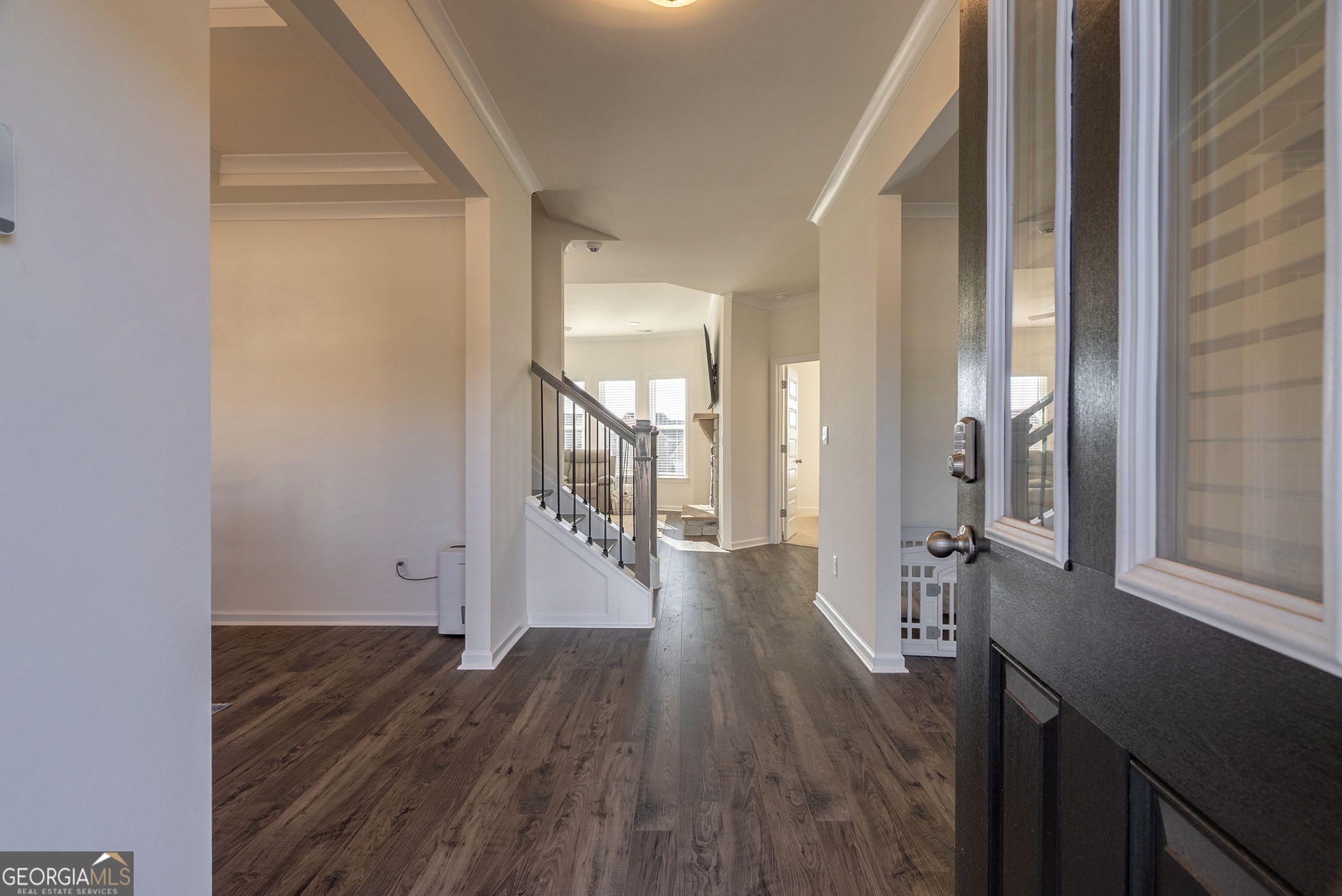 1110 Brookstone Crossing Statham, GA 30666 - Photo 12 of 69 a view of a hallway with wooden floor and a bathroom