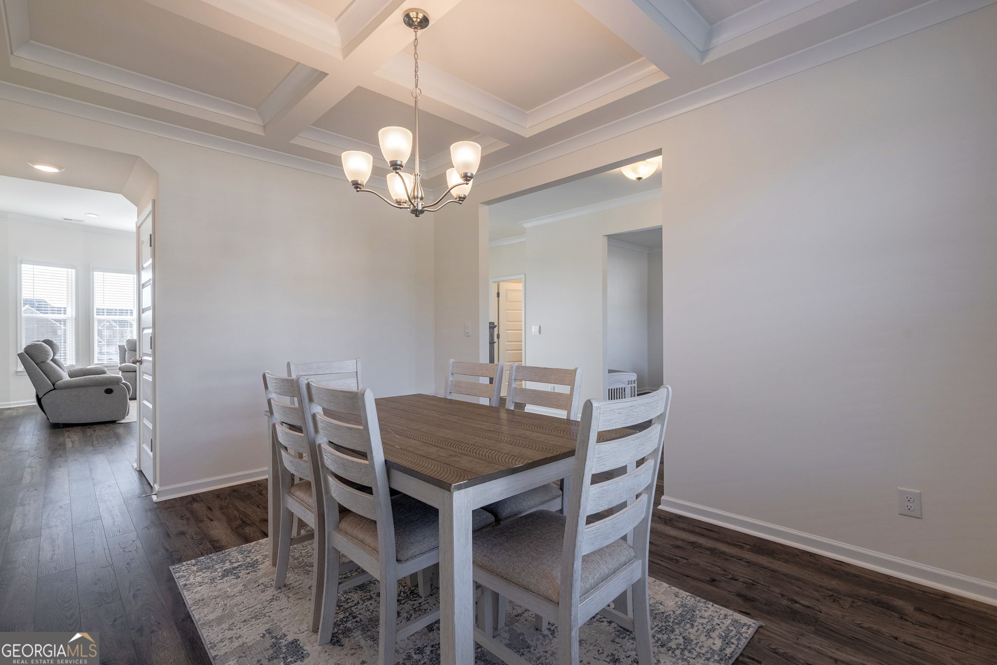 1110 Brookstone Crossing Statham, GA 30666 - Photo 19 of 69 a view of a dining room with furniture and wooden floor