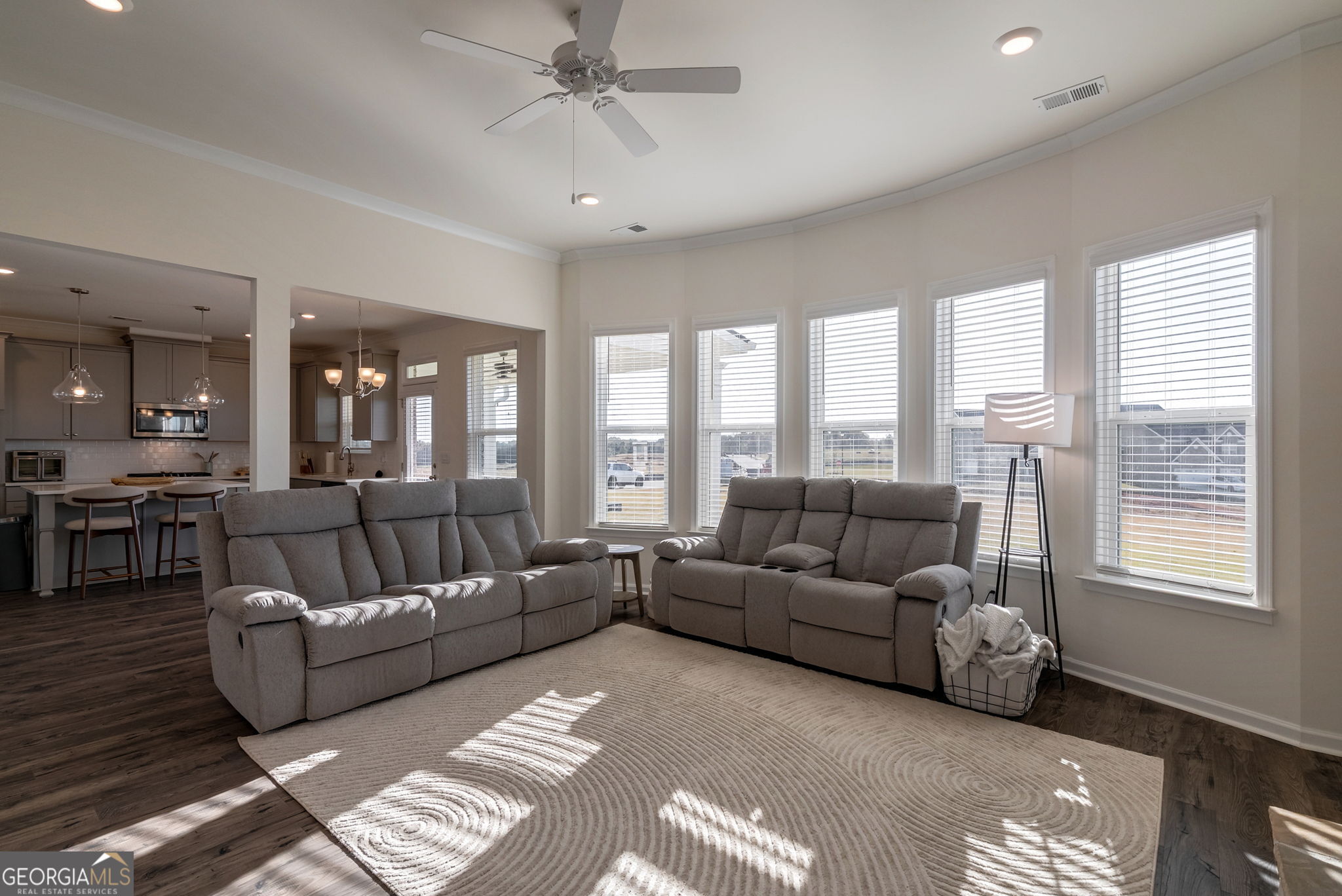 1110 Brookstone Crossing Statham, GA 30666 - Photo 2 of 69 a living room with furniture and a large window