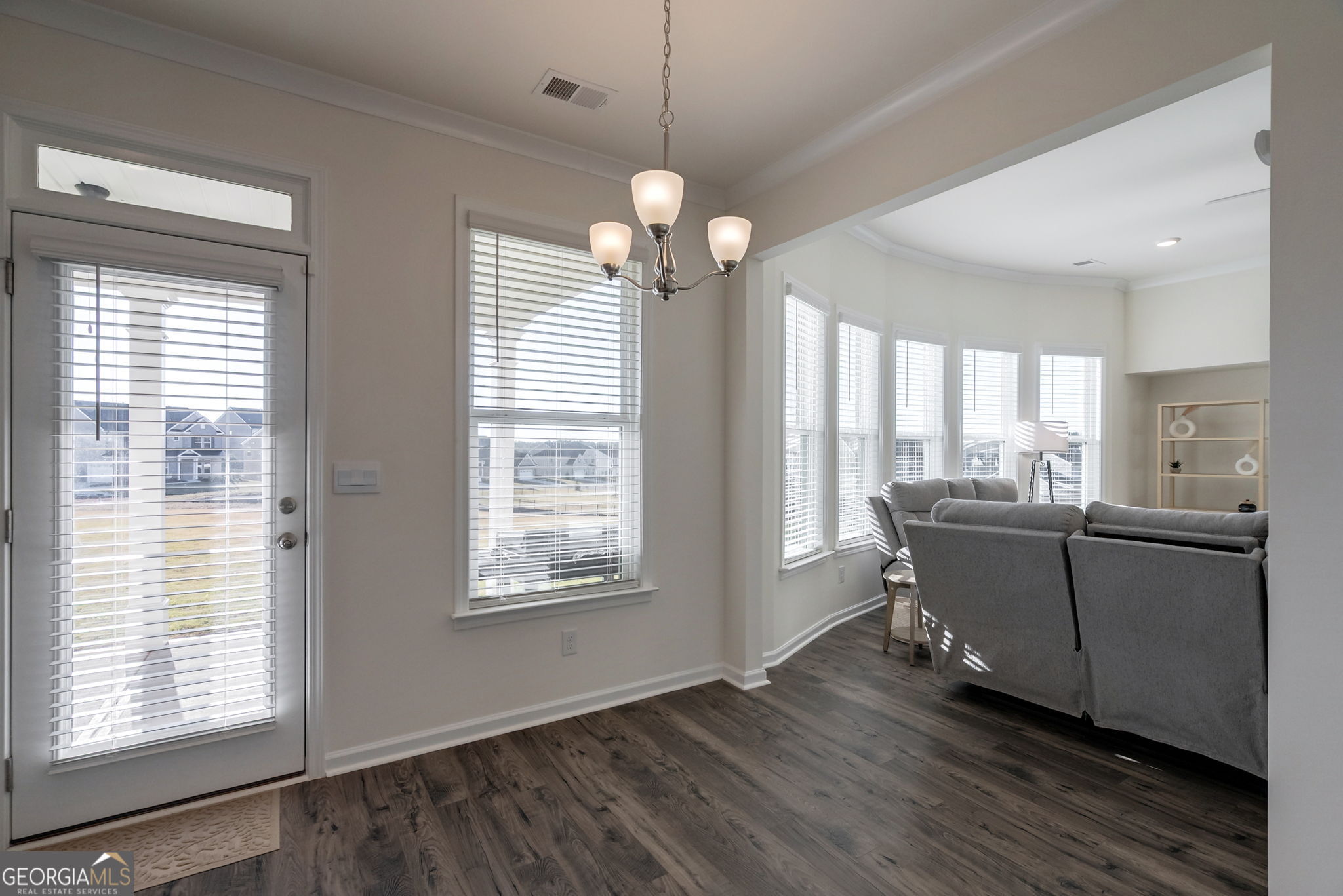 1110 Brookstone Crossing Statham, GA 30666 - Photo 23 of 69 a room with wooden floor and windows