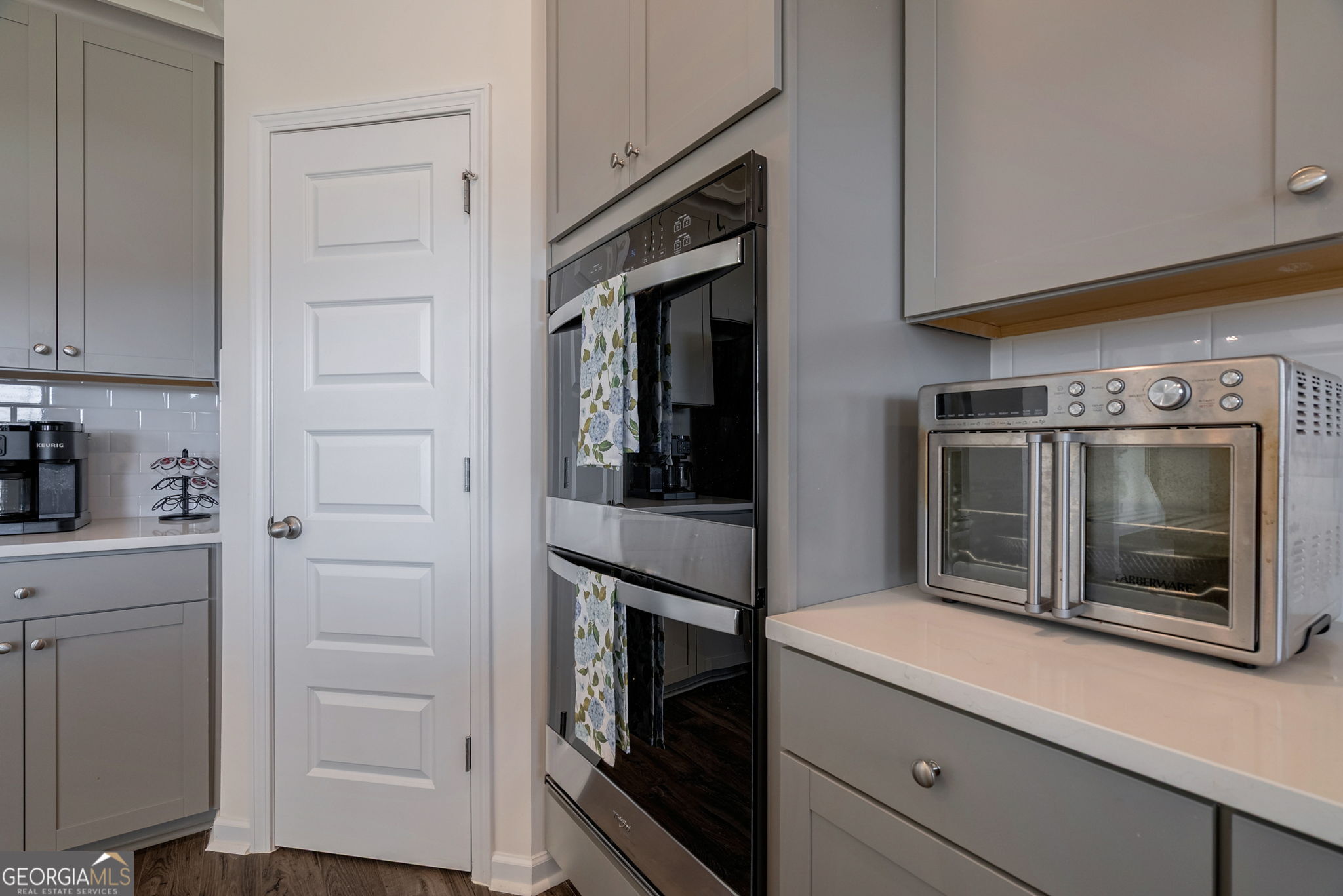 1110 Brookstone Crossing Statham, GA 30666 - Photo 28 of 69 a kitchen with a refrigerator and cabinets