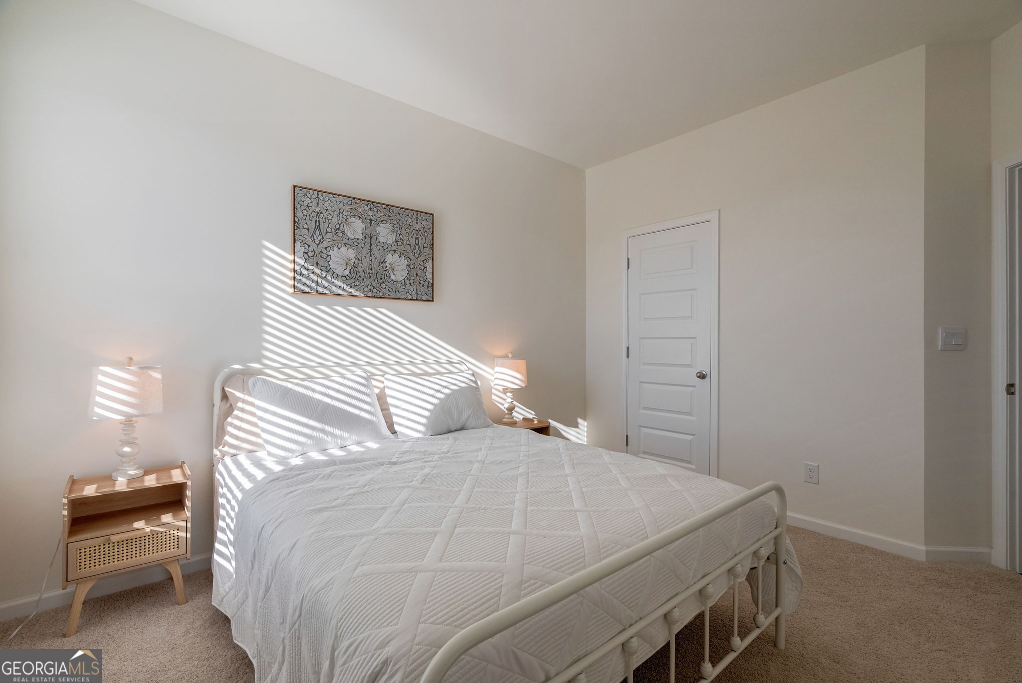 1110 Brookstone Crossing Statham, GA 30666 - Photo 31 of 69 a bedroom with a bed and chairs