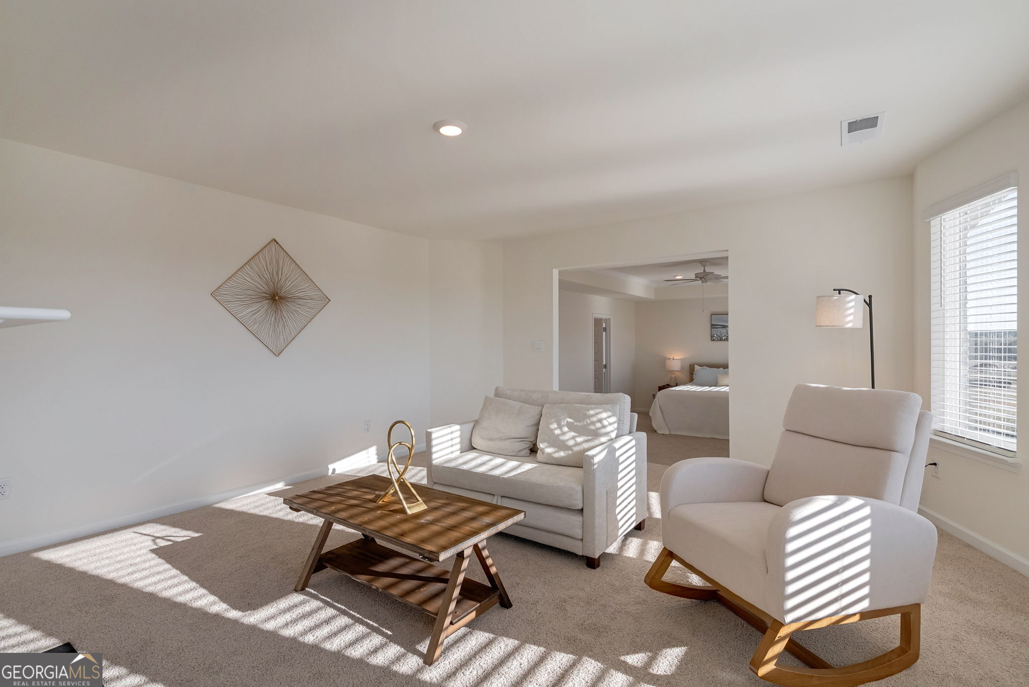 1110 Brookstone Crossing Statham, GA 30666 - Photo 40 of 69 a living room with furniture and a window