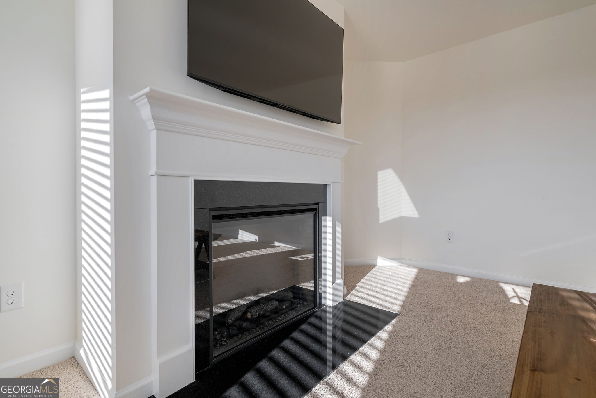 1110 Brookstone Crossing Statham, GA 30666 - Photo 41 of 69 a living room with furniture and a fireplace