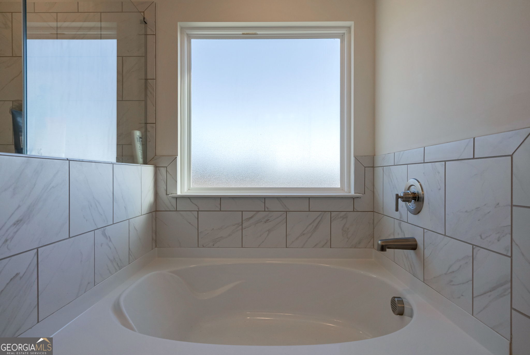 1110 Brookstone Crossing Statham, GA 30666 - Photo 43 of 69 a bathroom with a bathtub