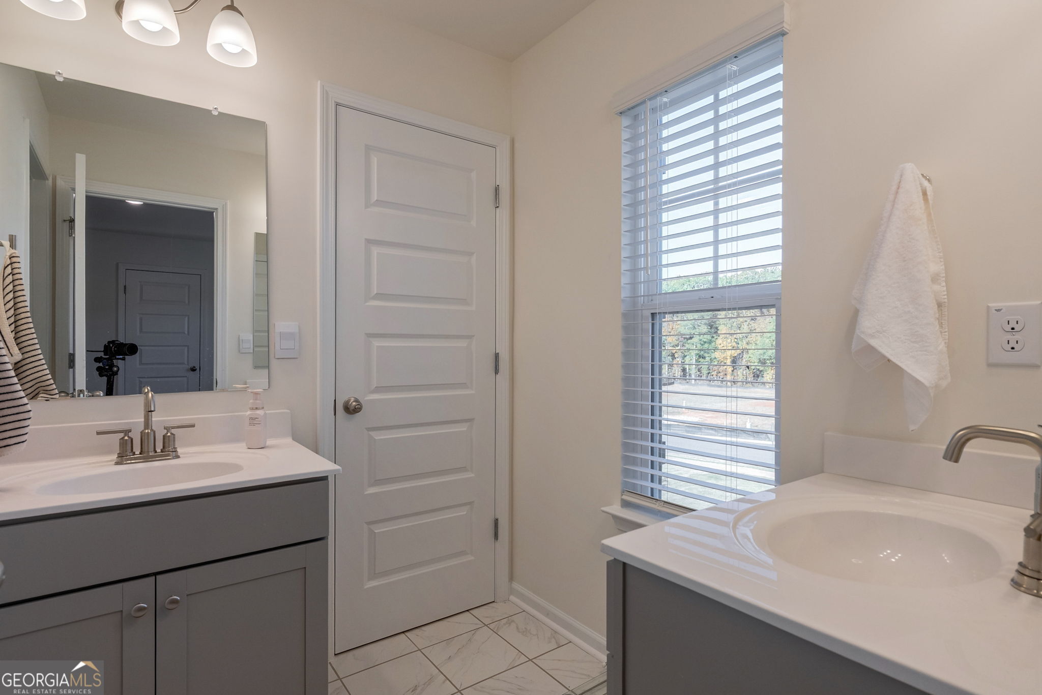1110 Brookstone Crossing Statham, GA 30666 - Photo 50 of 69 a bathroom with a sink and a bathtub