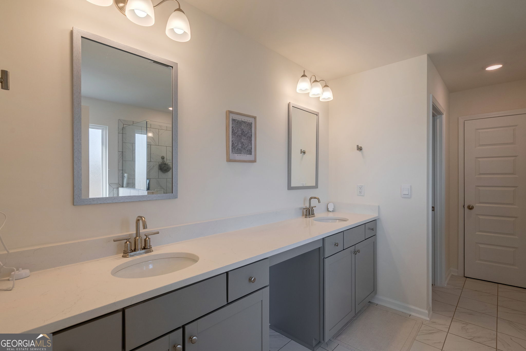 1110 Brookstone Crossing Statham, GA 30666 - Photo 5 of 69 a bathroom with a sink and a mirror