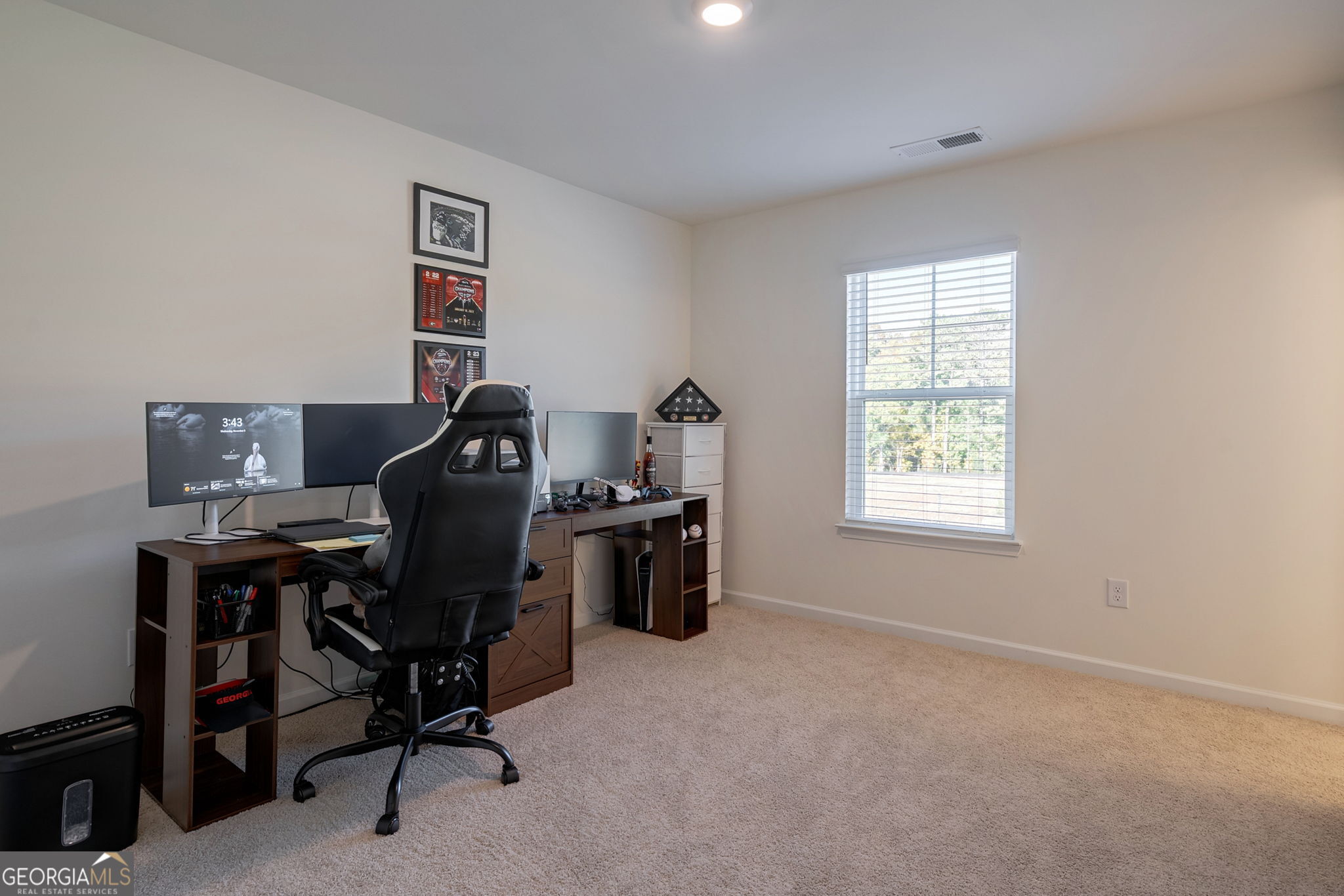 1110 Brookstone Crossing Statham, GA 30666 - Photo 54 of 69 a view of a workspace with furniture and a window