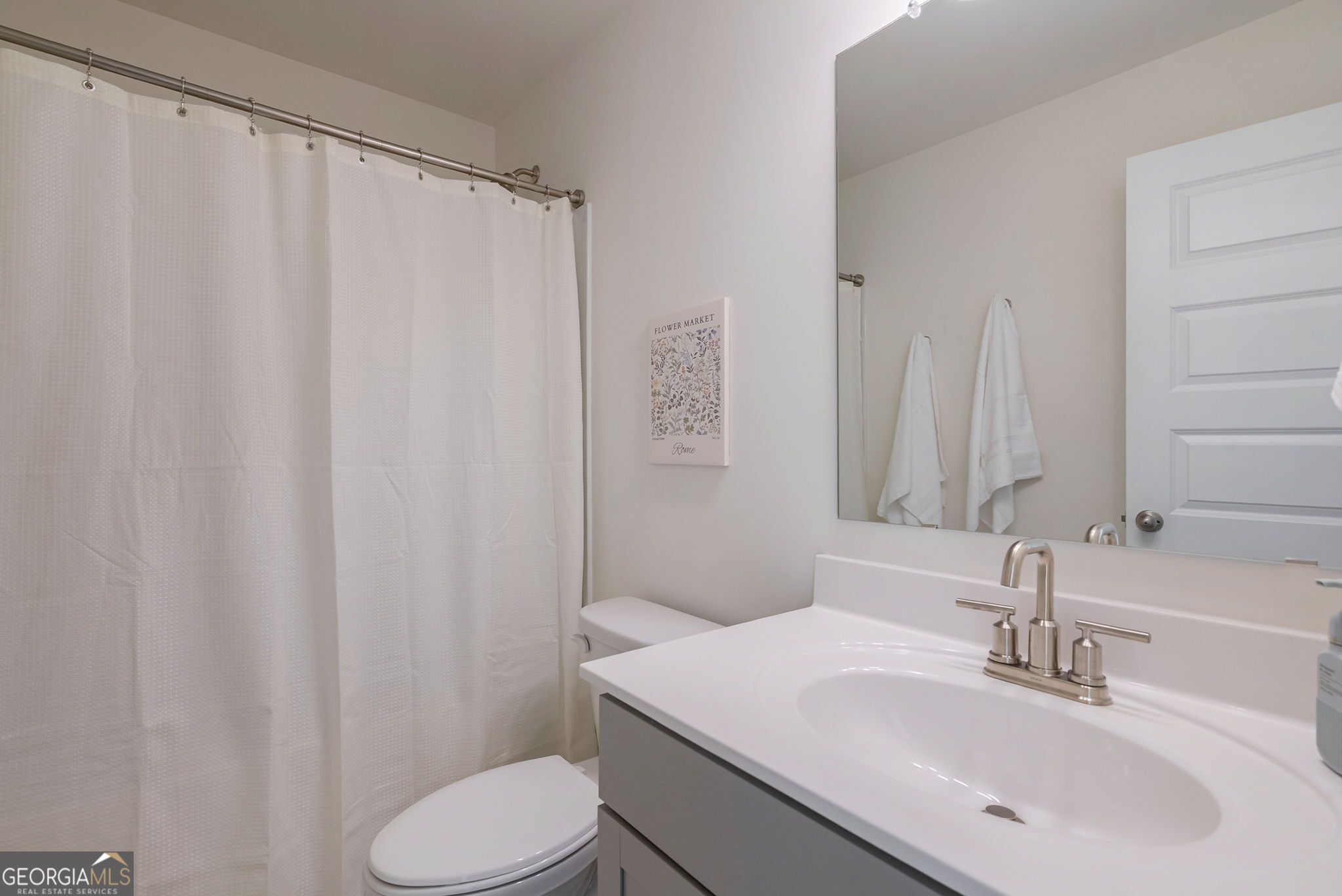 1110 Brookstone Crossing Statham, GA 30666 - Photo 57 of 69 a bathroom with a sink toilet and shower