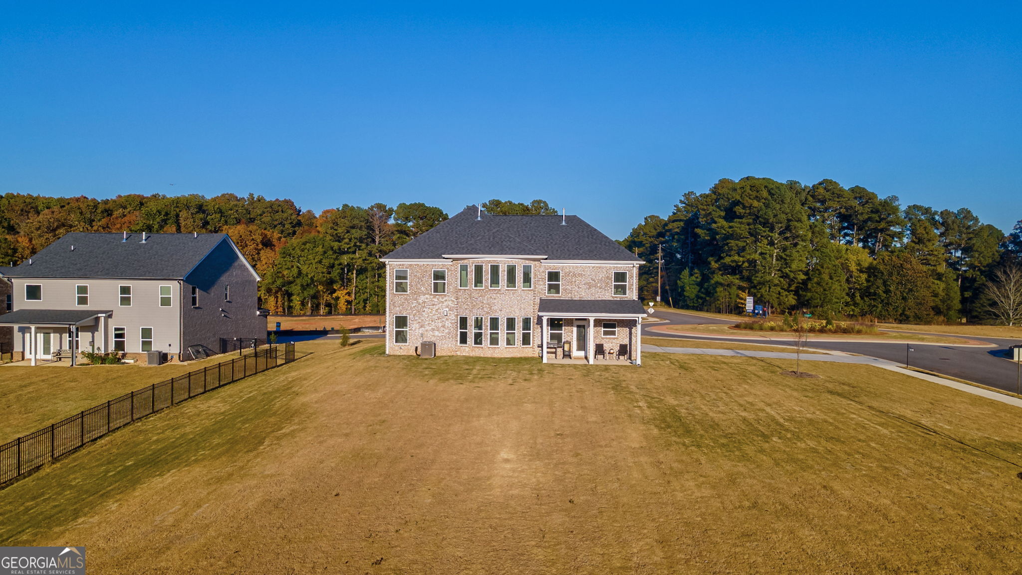 1110 Brookstone Crossing Statham, GA 30666 - Photo 61 of 69 a view of a building with a yard