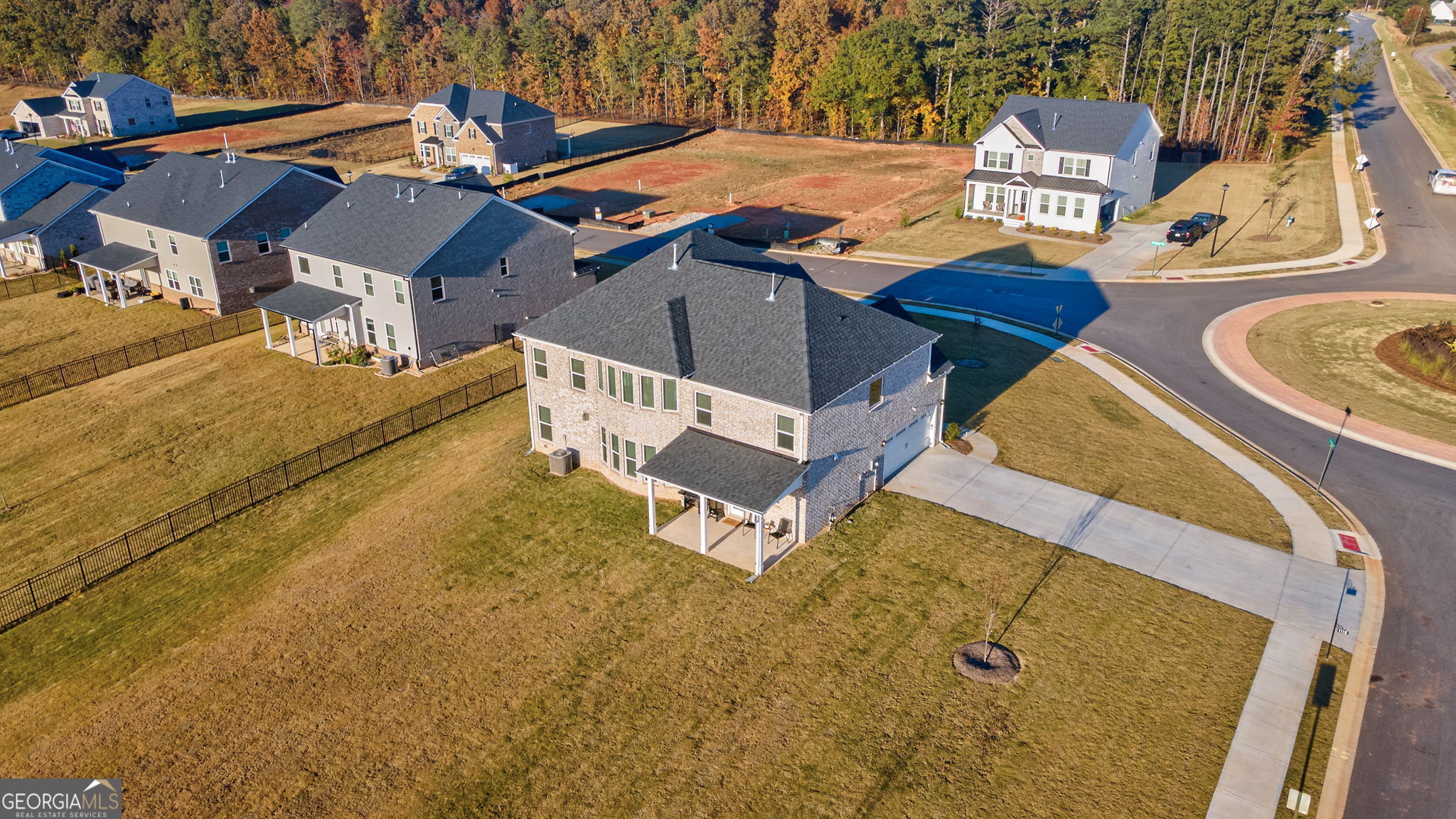 1110 Brookstone Crossing Statham, GA 30666 - Photo 66 of 69 an aerial view of a house with swimming pool